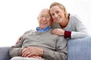 An image of a father and his daughter talking about Live in Care