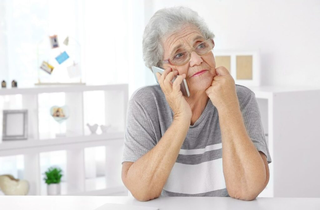 elderly woman having trouble speaking due to dementia