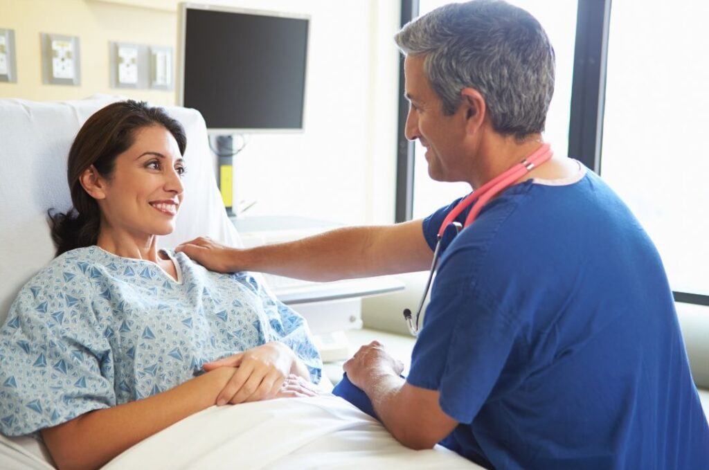 doctor talking to patient