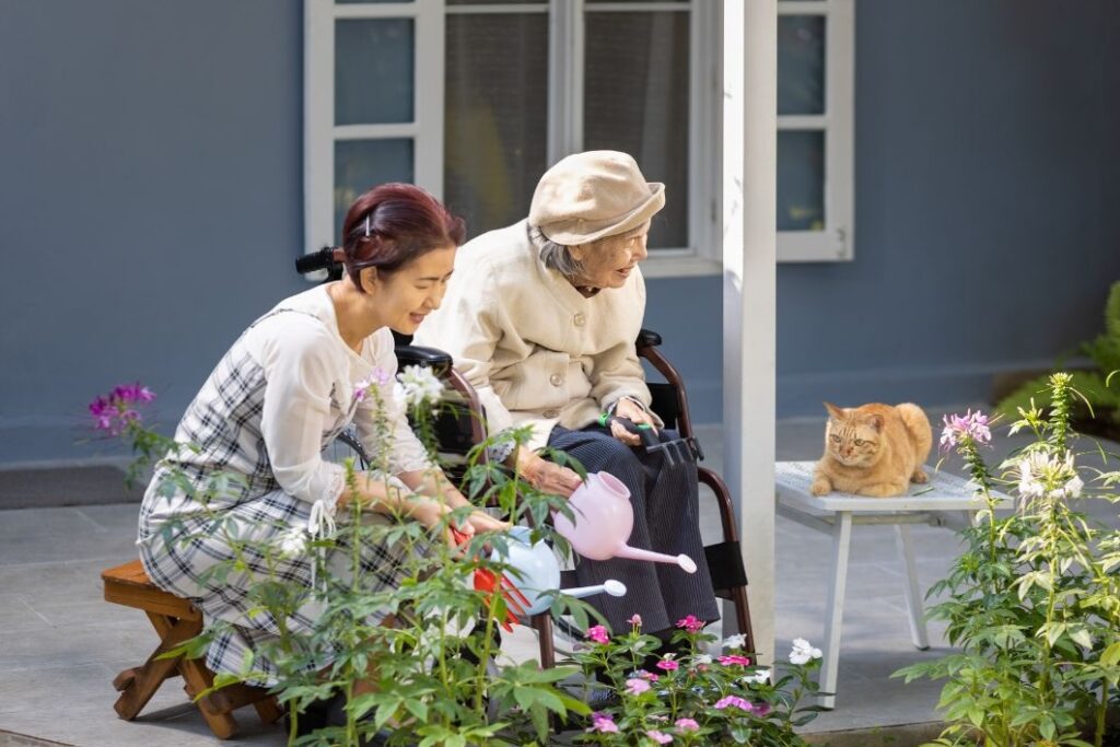 elderly woman and her pet cat