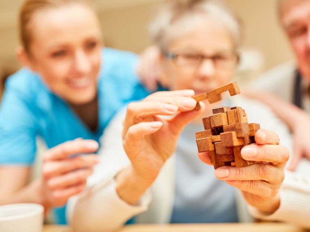 Lady with Alzheimers playing a game