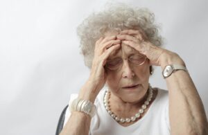 Elderly woman with headache