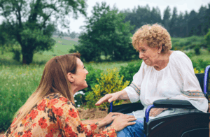 aregiver assisting an elderly person, illustrating the benefits of respite care