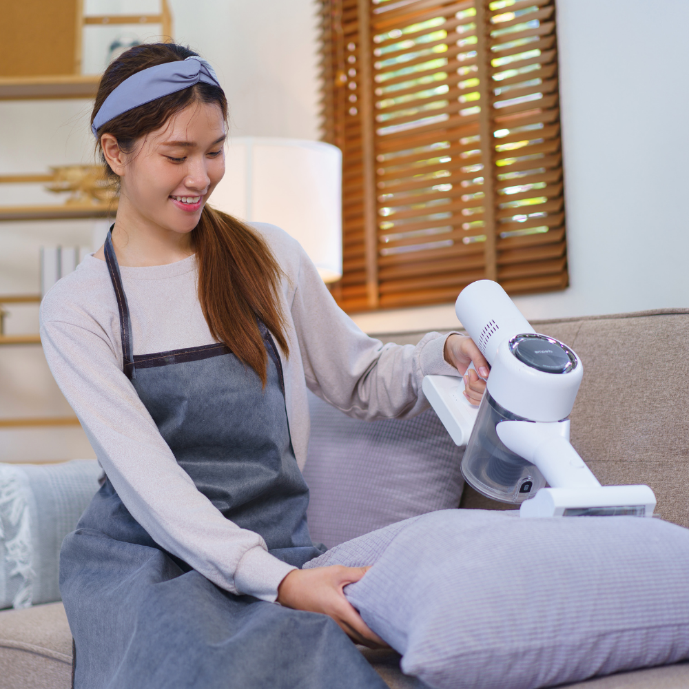 housekeeper focuses on ironing